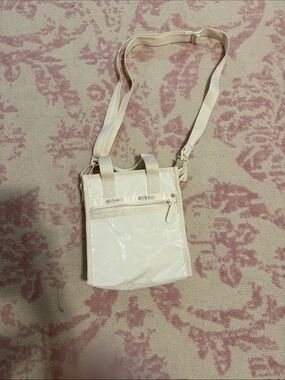 Lesportsac Cream Patent Crossbody Bag with Front Zip